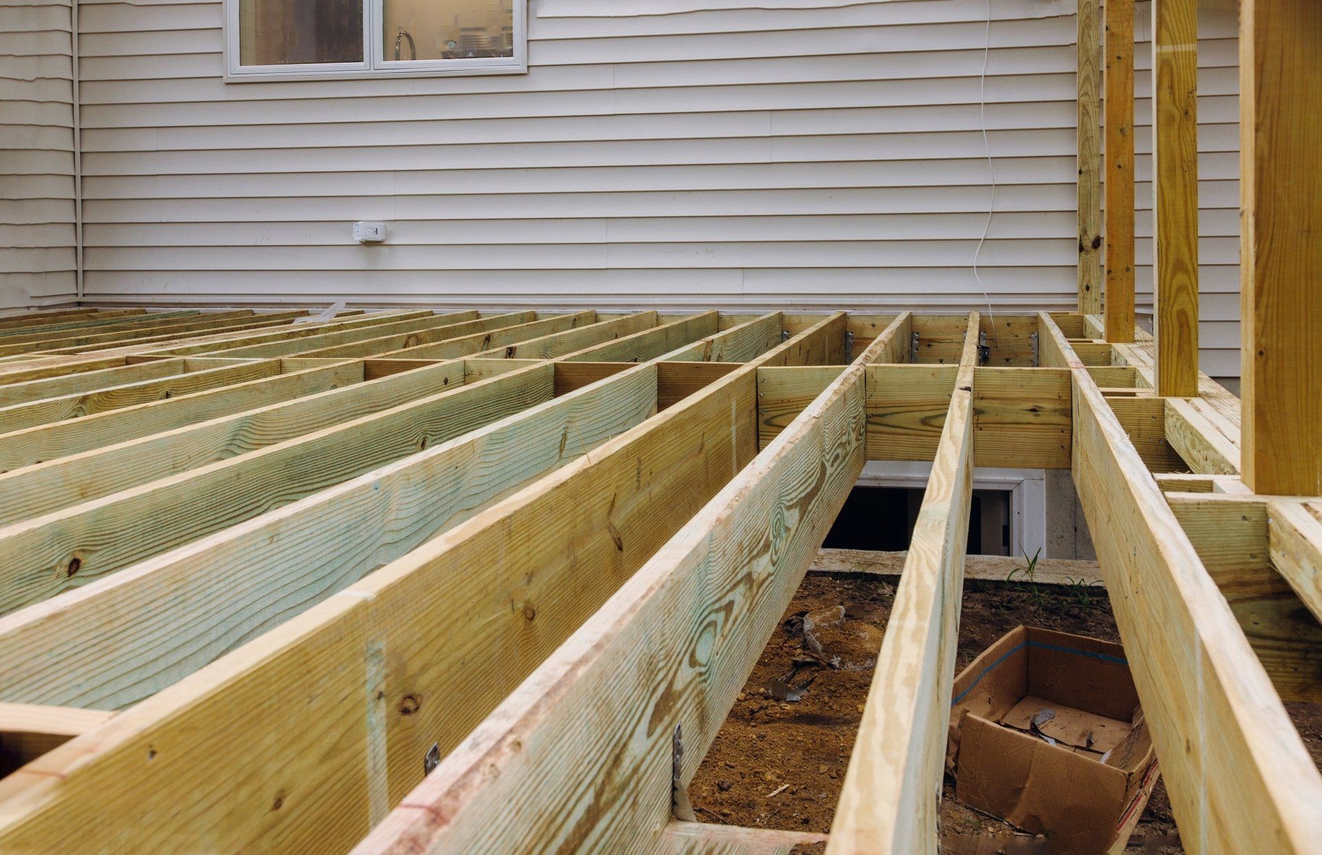 Installation of patio, wooden boards are in place ready for the next step
