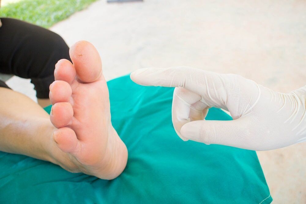A Person's Foot Being Examined By A Doctor — Lake Macquarie Podiatry in Belmont, NSW