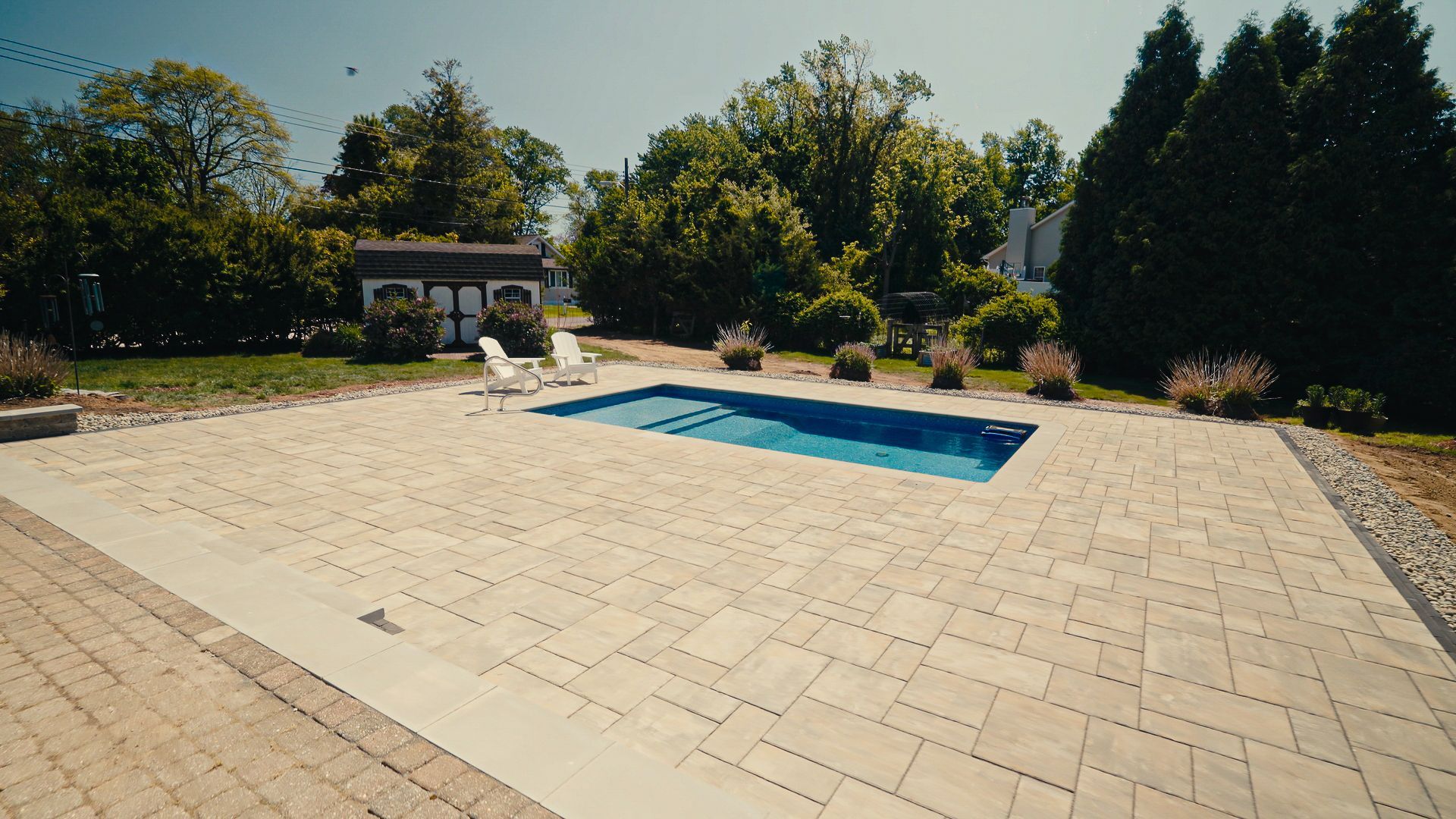 Circular paver patio with built-in fire pit
