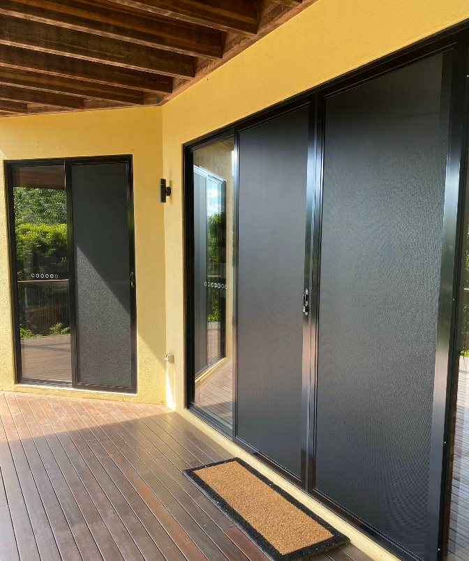 Silver Window Handles, One Open, on a White Window Frame — All Security Screens & Repairs In Bungalow, QLD