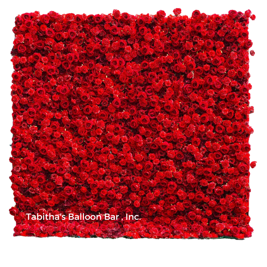 Square wall of vibrant red roses.