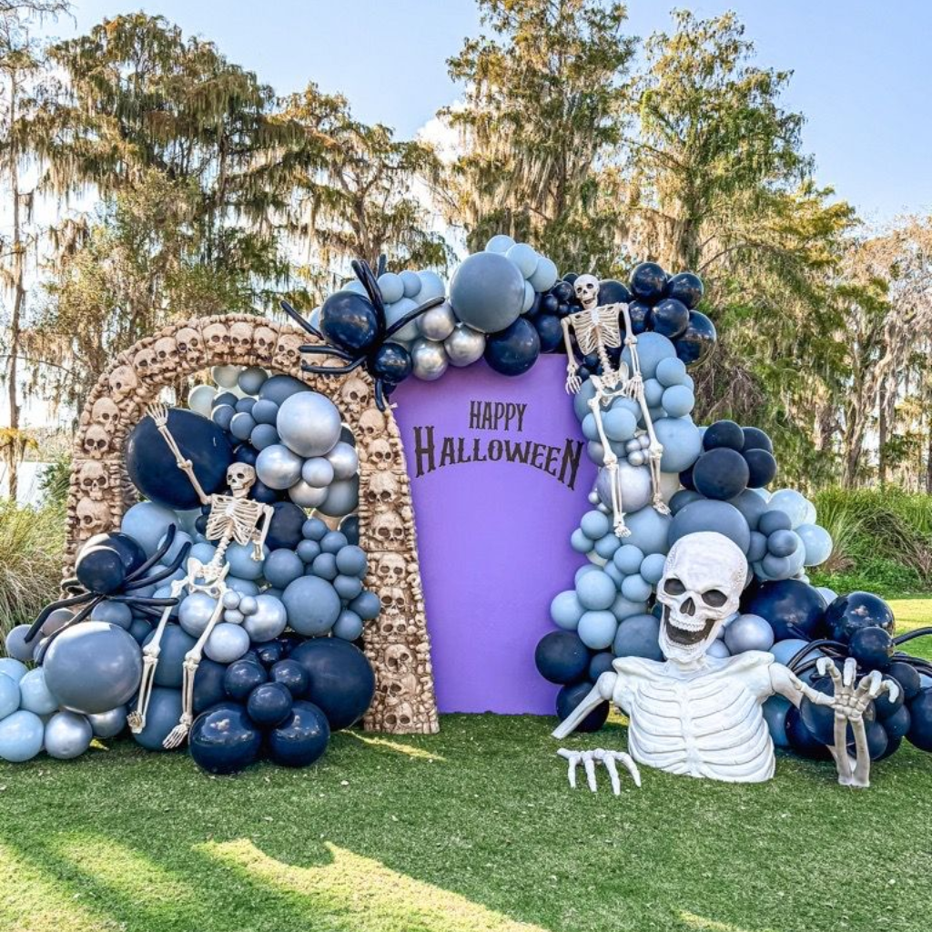 Halloween balloon photo backdrop with skeletons and black, purple and silver balloons in Orlando