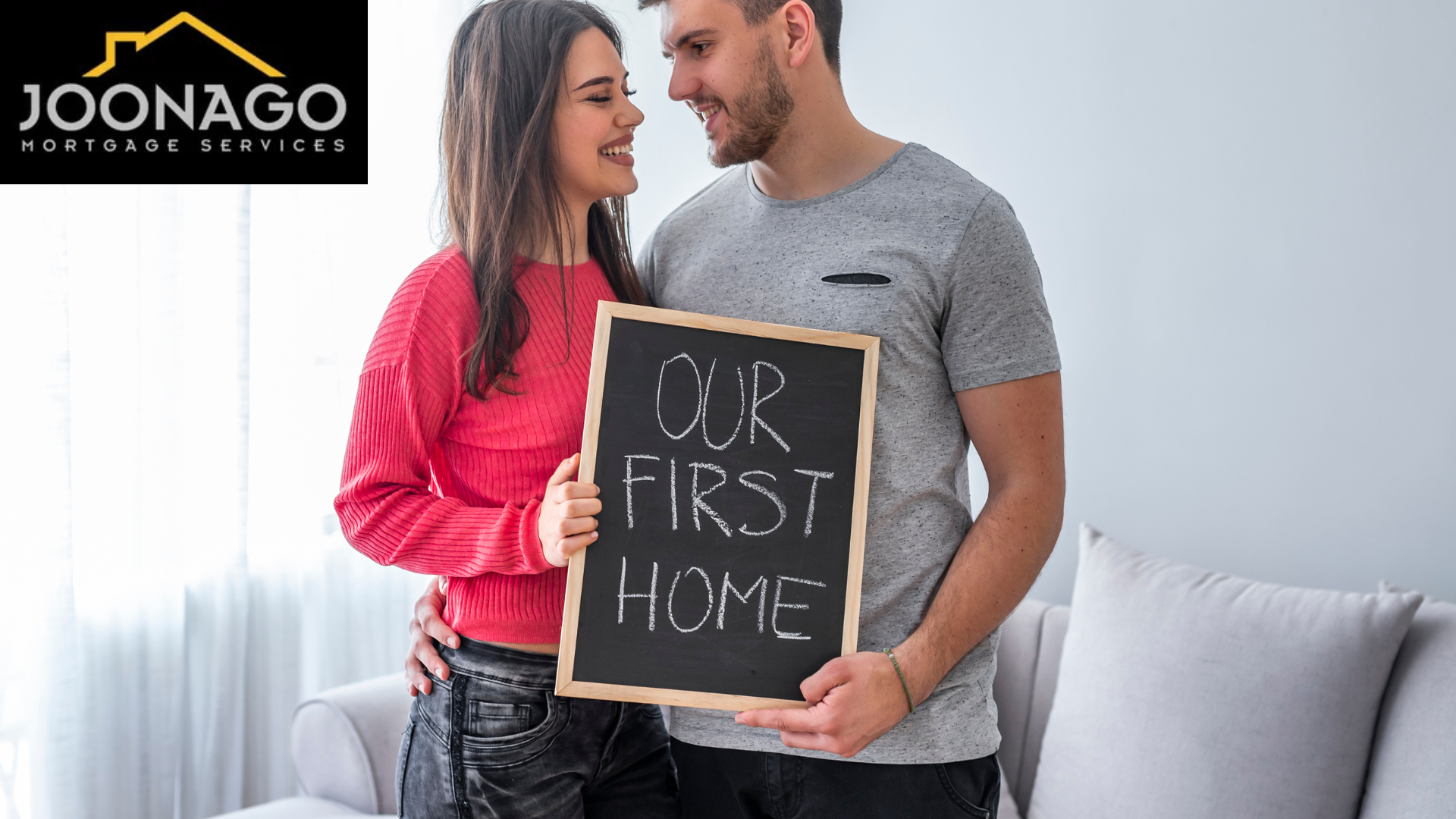 A man and a woman are holding a sign that says `` our first home ''.