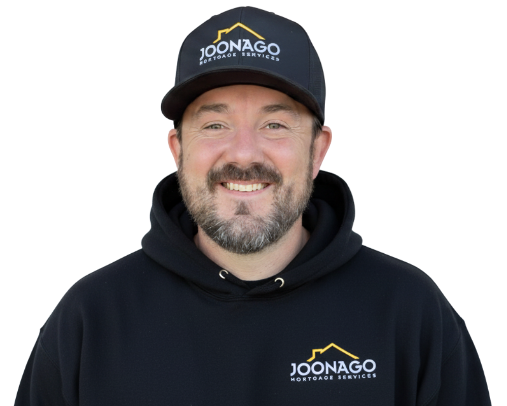 Man wearing a black hat and hoodie with the 