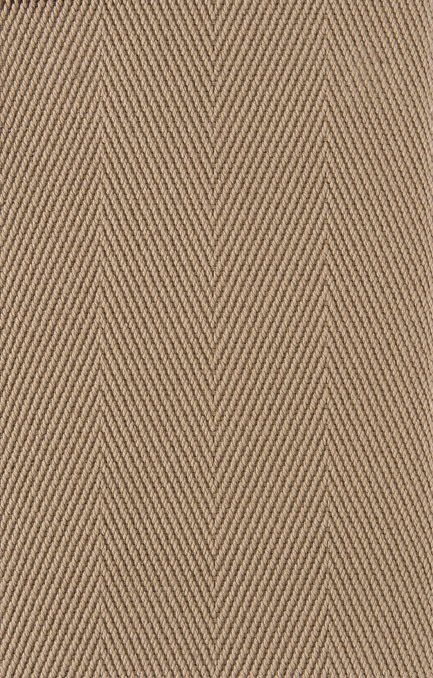 Tan herringbone fabric pattern.