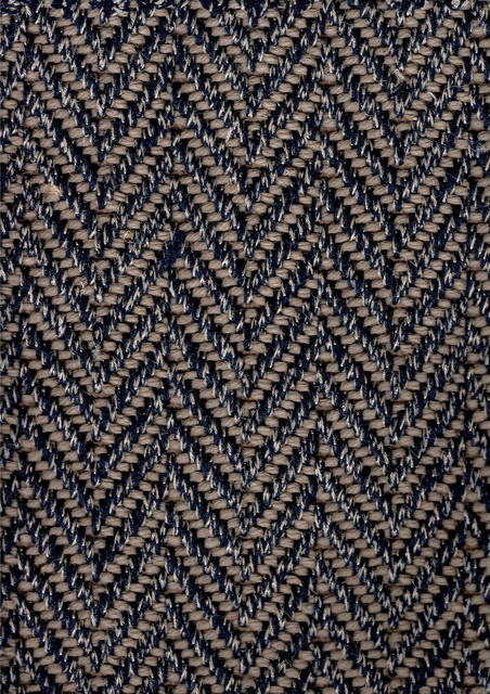 Chevron-patterned textile in navy and off-white.