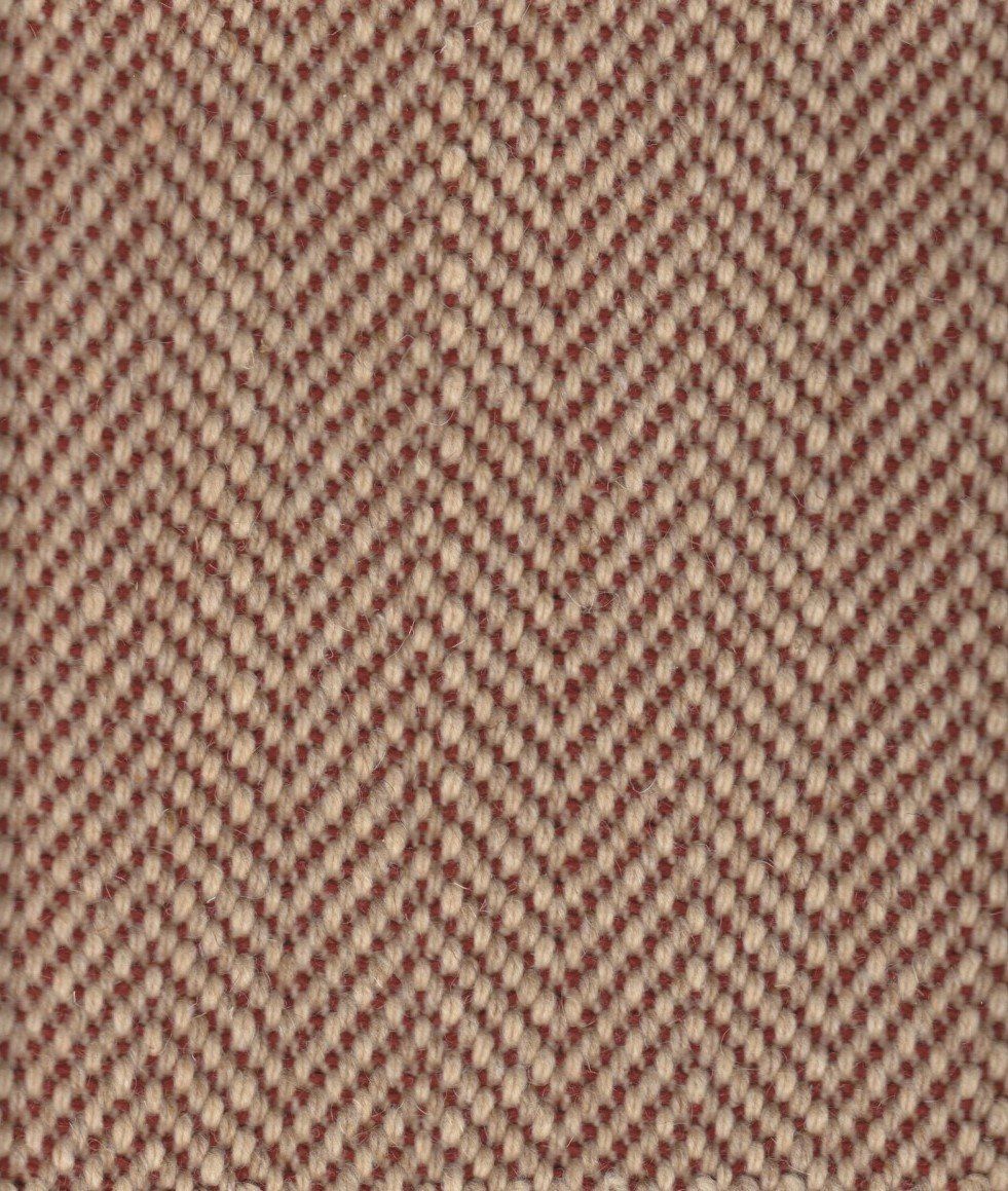 Herringbone-patterned textile in reddish-brown and beige.