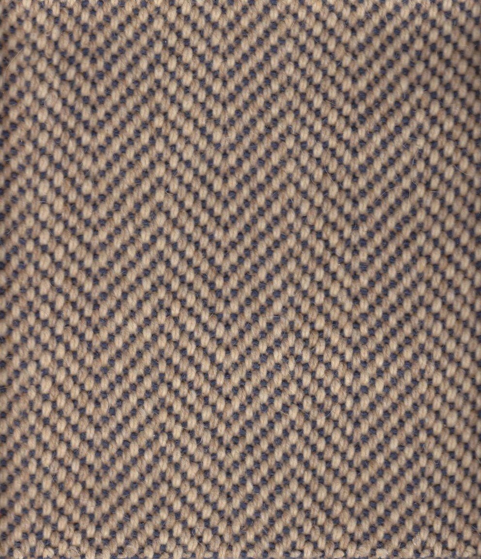 Herringbone pattern fabric in dark blue and tan.
