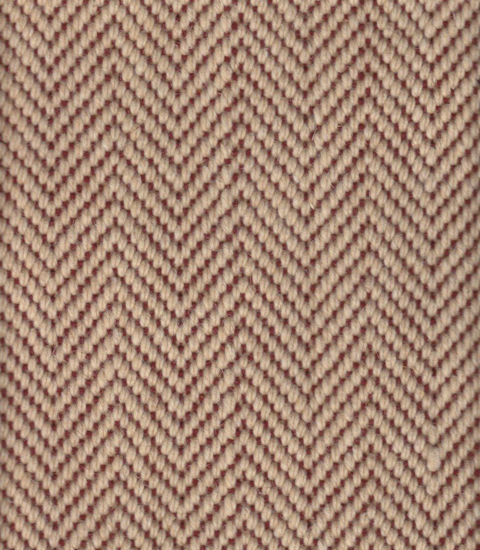Herringbone pattern fabric in tan and maroon.