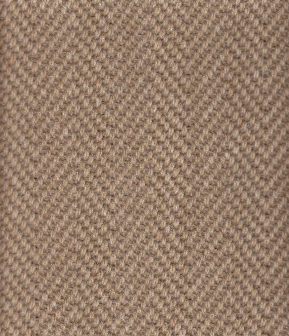 Tan herringbone fabric texture.