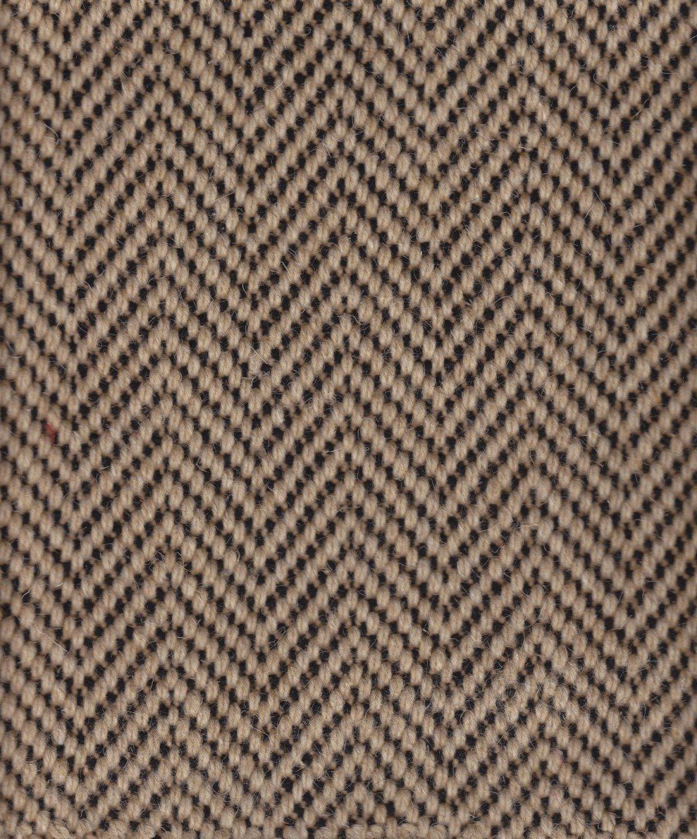 Herringbone patterned fabric in beige and black.