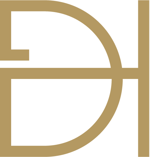 Gold monogram of the letters D and H, intertwined and stylized.
