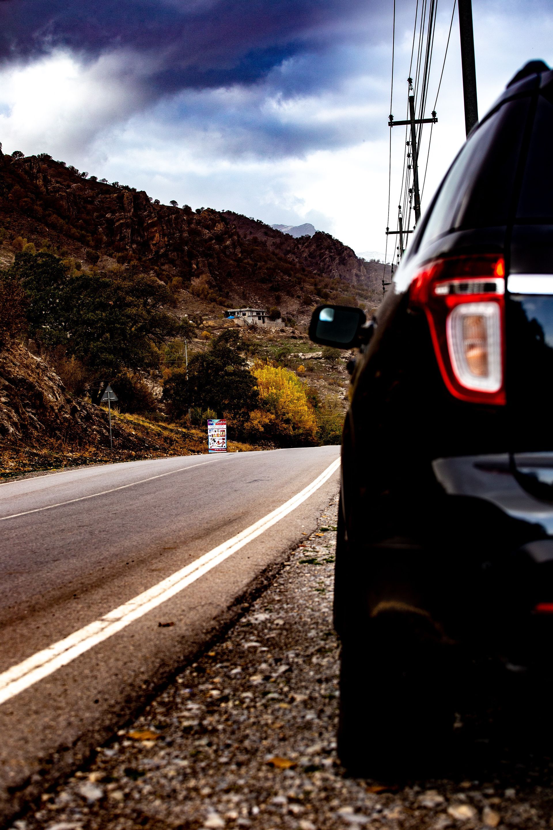 Car Showing A Tail Light On Long Road - Auto Electrical Service in Garbutt, QLD