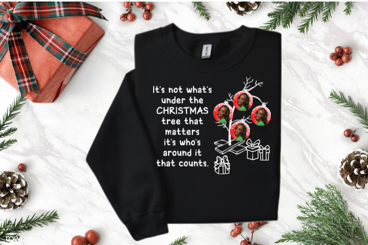 A black t-shirt that says `` it 's not what 's under the christmas tree that matters ''