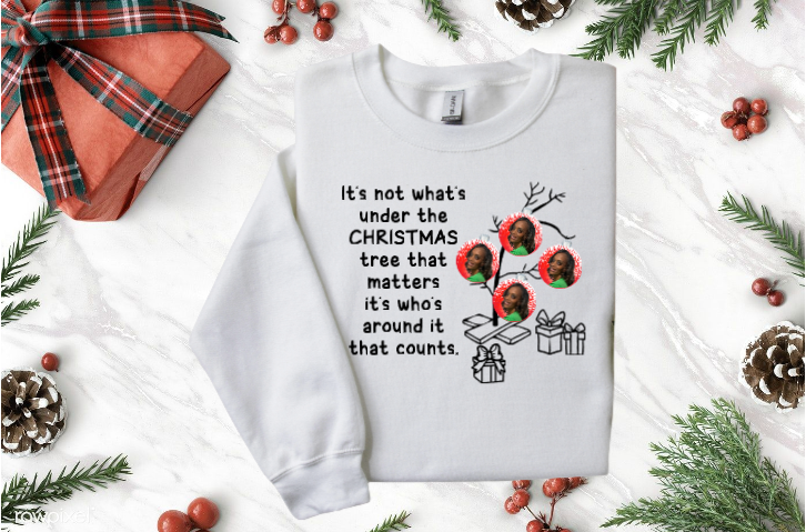 A black t-shirt that says `` it 's not what 's under the christmas tree that matters ''