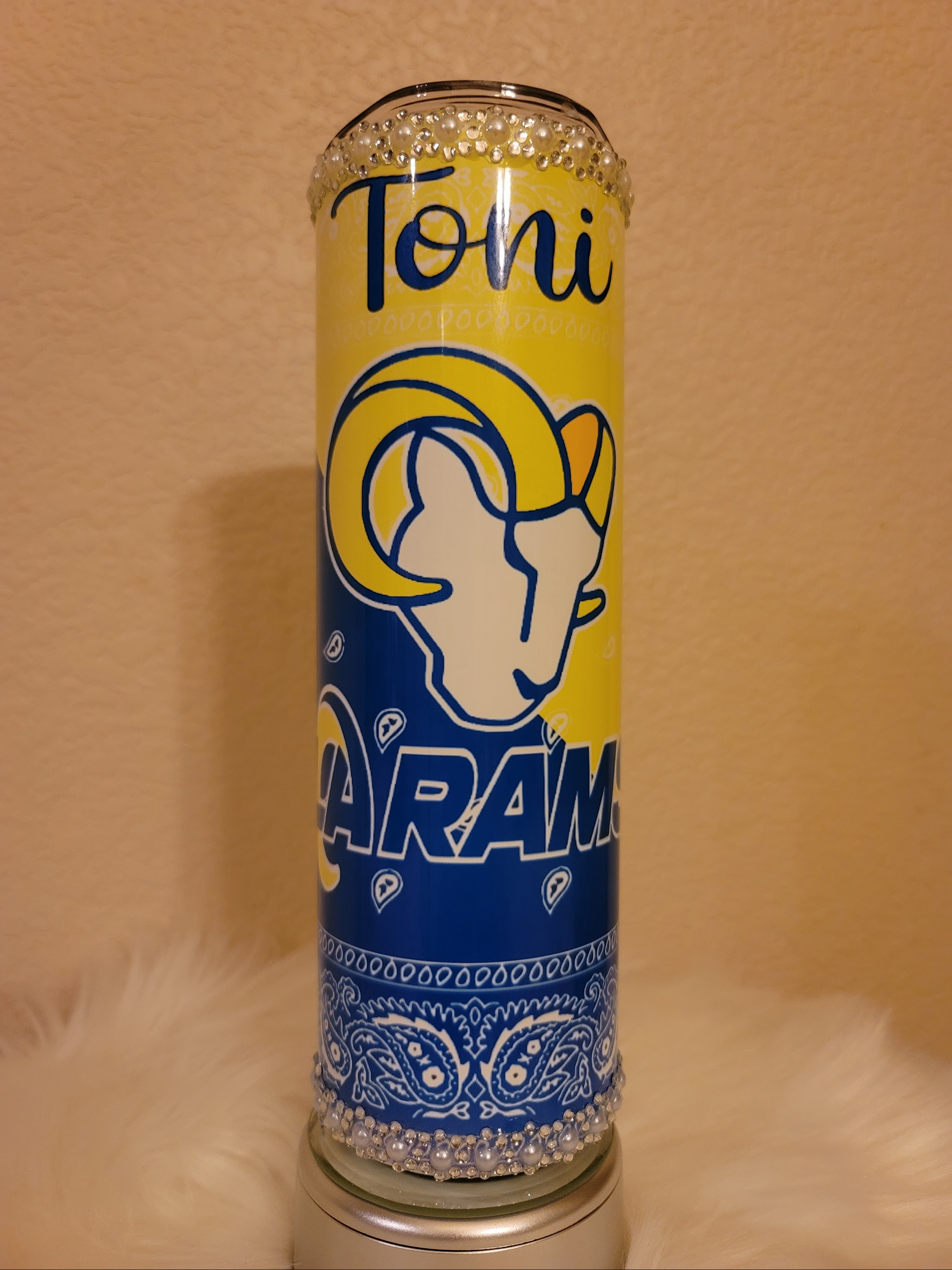 A ram tumbler with the name toni on it