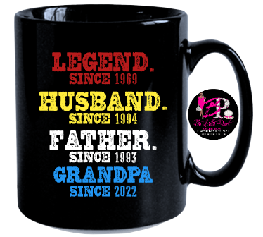 A black mug that says legend since 1969 husband since 1994 father since 1993 grandpa since 2022