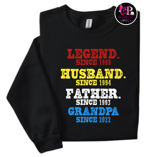 A black shirt that says legend since 1989 husband since 1994 father since 1993 grandpa since 2022