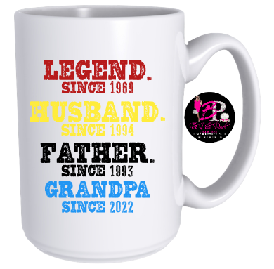 A black mug that says legend since 1969 husband since 1994 father since 1993 grandpa since 2022