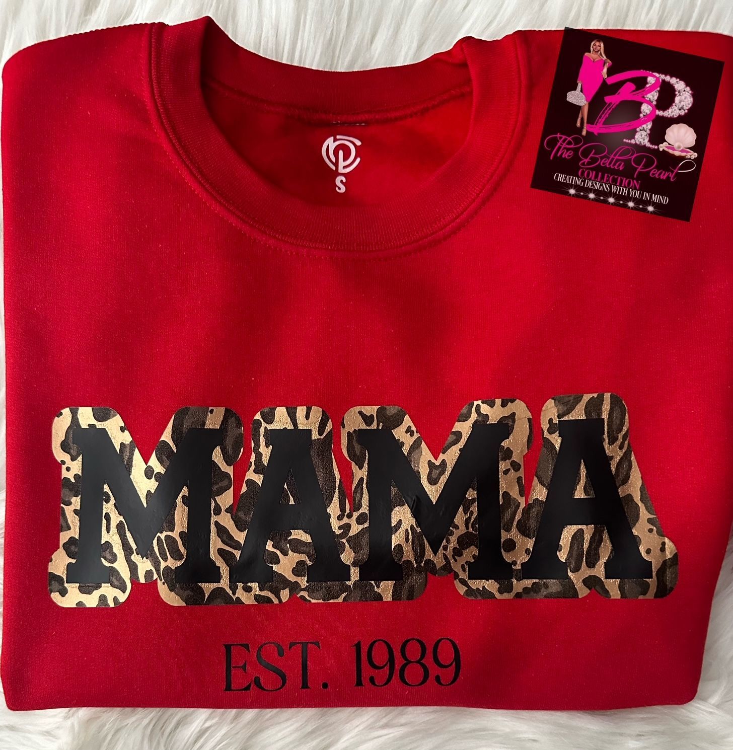 A red shirt with the word mama on it