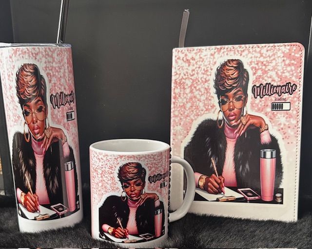 A tumbler a mug and a notebook with a woman on them