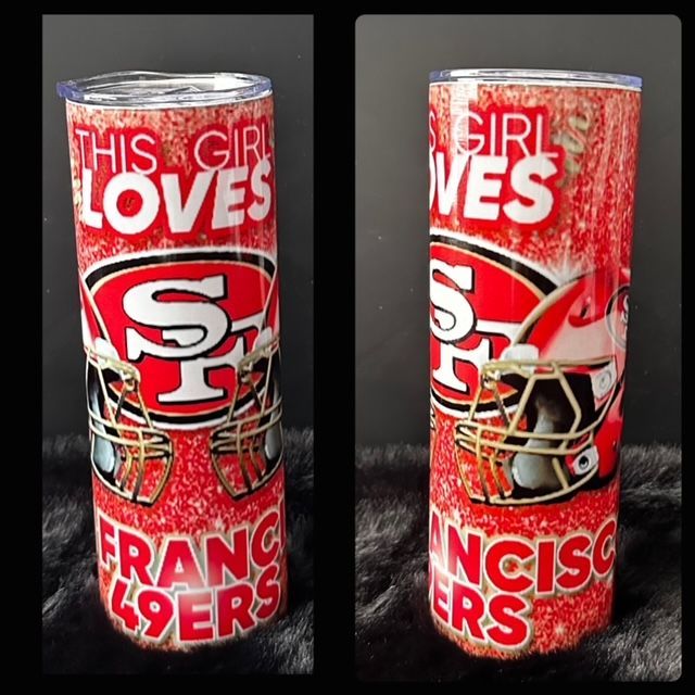 A stainless steel tumbler that says this girl loves san francisco 49ers