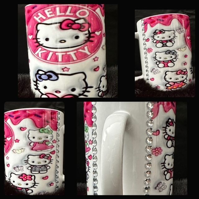 A hello kitty mug with rhinestones on it