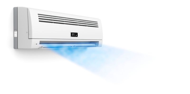 White wall-mounted air conditioner blowing a stream of cool blue air