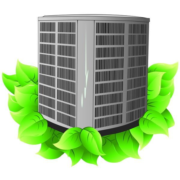 Gray HVAC condenser surrounded by bright green leaves, symbolizing eco-friendly cooling
