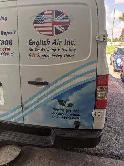 White service van with English Air Inc. HVAC branding and logo, parked on a street.