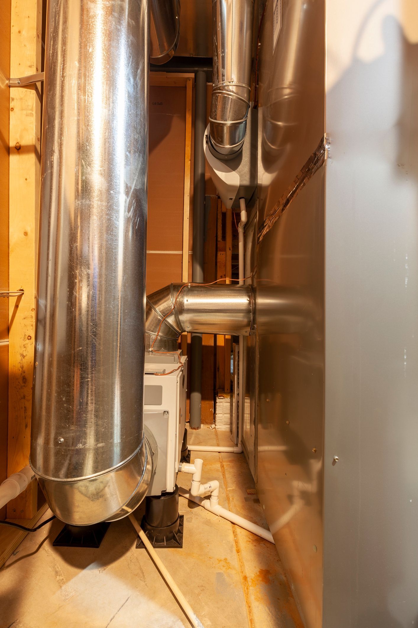 Whole-home dehumidifier connected to a residential HVAC system in an Orlando, Florida home.