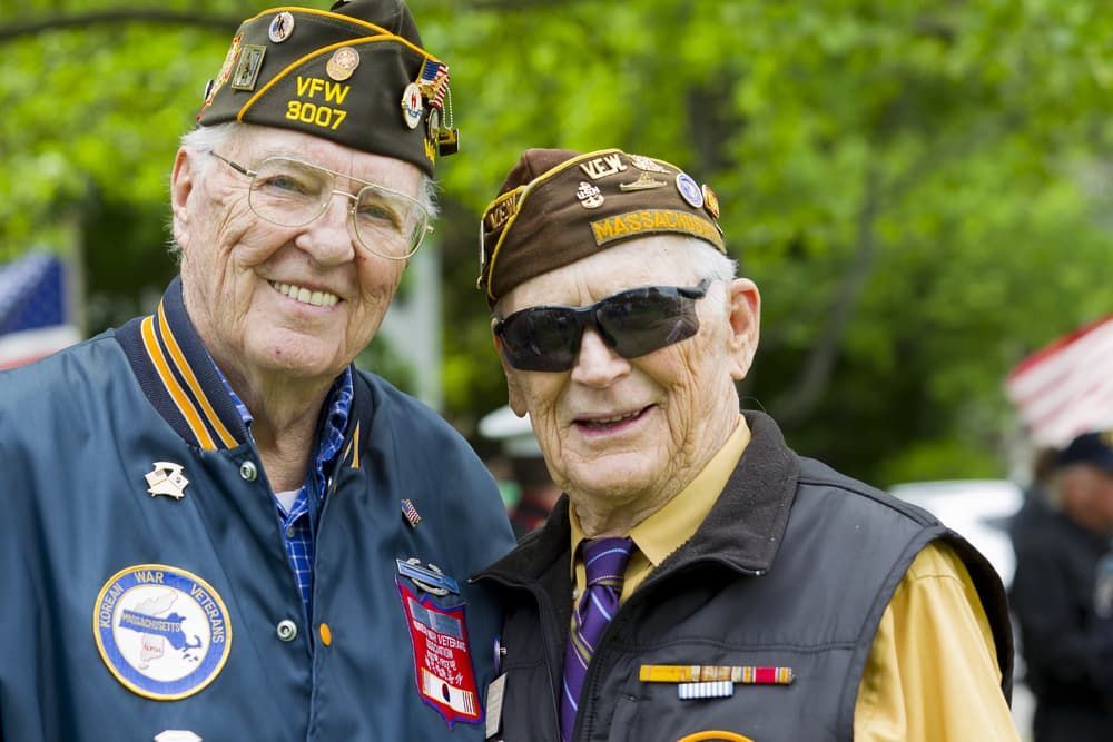 Two veterans smiling at the memorial day — CCTV in Townsville