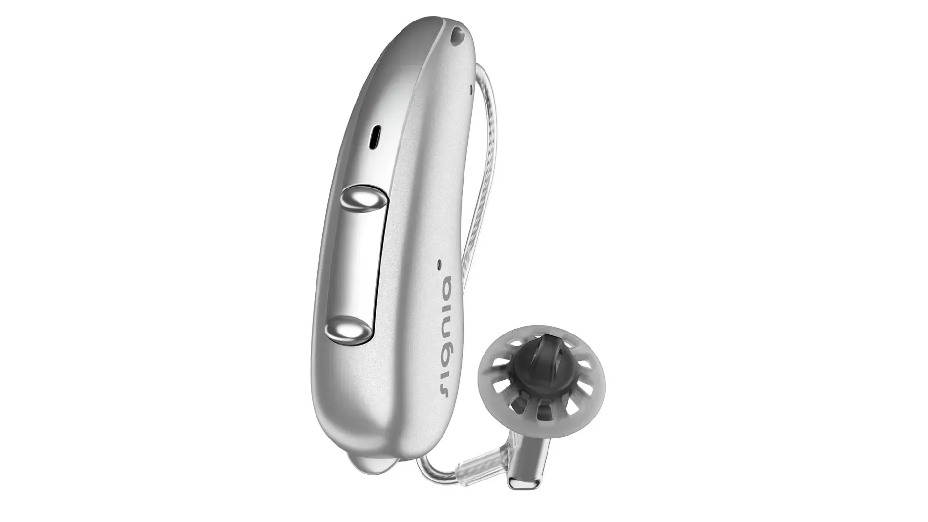 Silver hearing aid with earmold and clear tubing on a white background