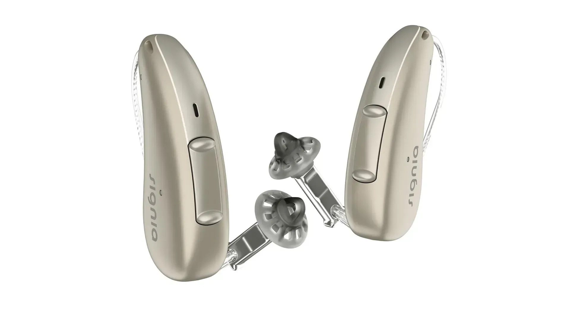 Two beige behind-the-ear hearing aids on a white background