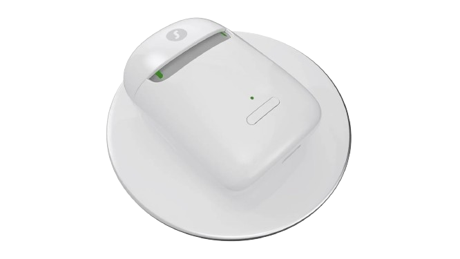 White wall-mounted smoke detector with a small green indicator light on a white background