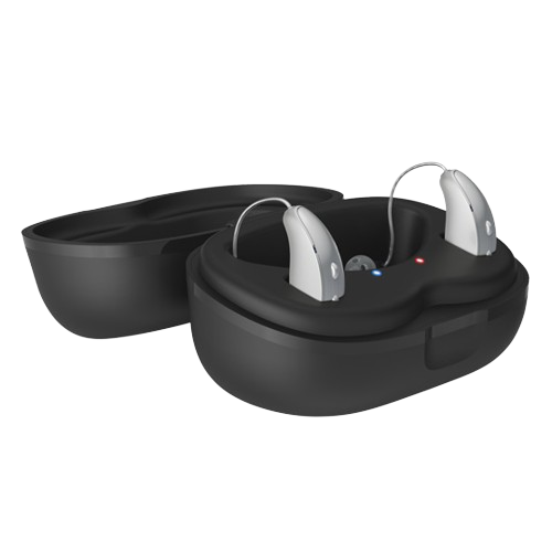 Black oval hearing aid charging case with two silver hearing aids inside, on a white background