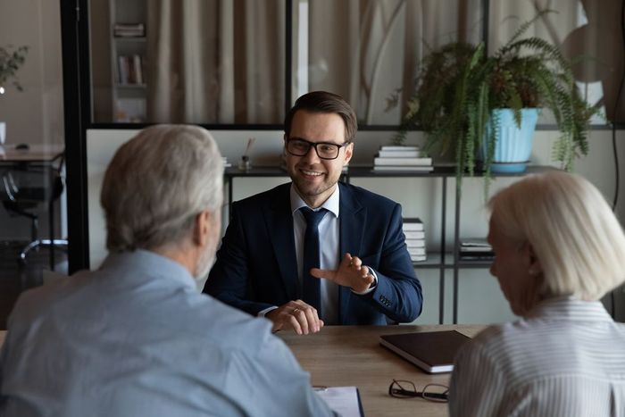 Happy Consultant Talking to his Clients — Clarence Property Consultants In Grafton, NSW