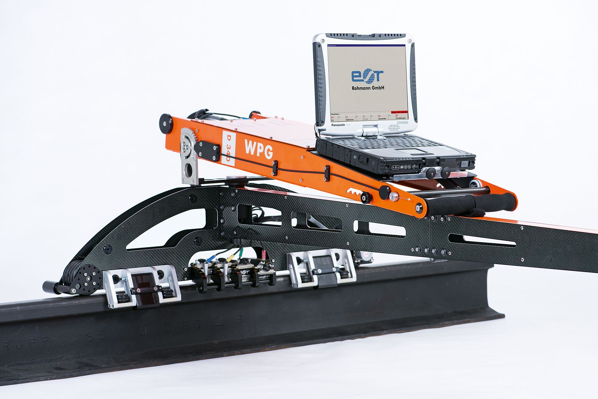 A wpg machine with a laptop on top of it