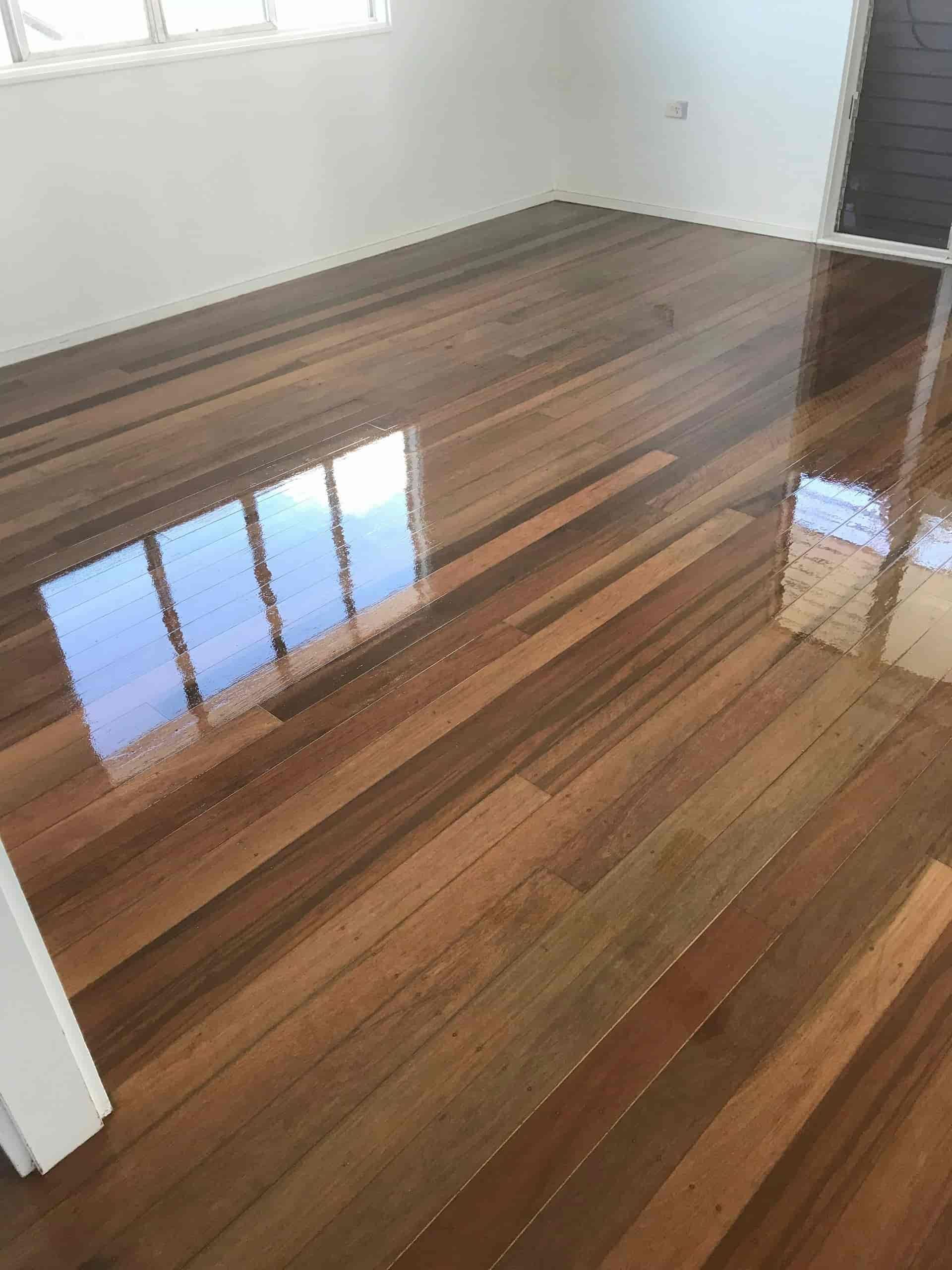 A Room With a Wooden Floor and a Window — Timbertop Floor Sanding & Polishing In Bungalow, QLD