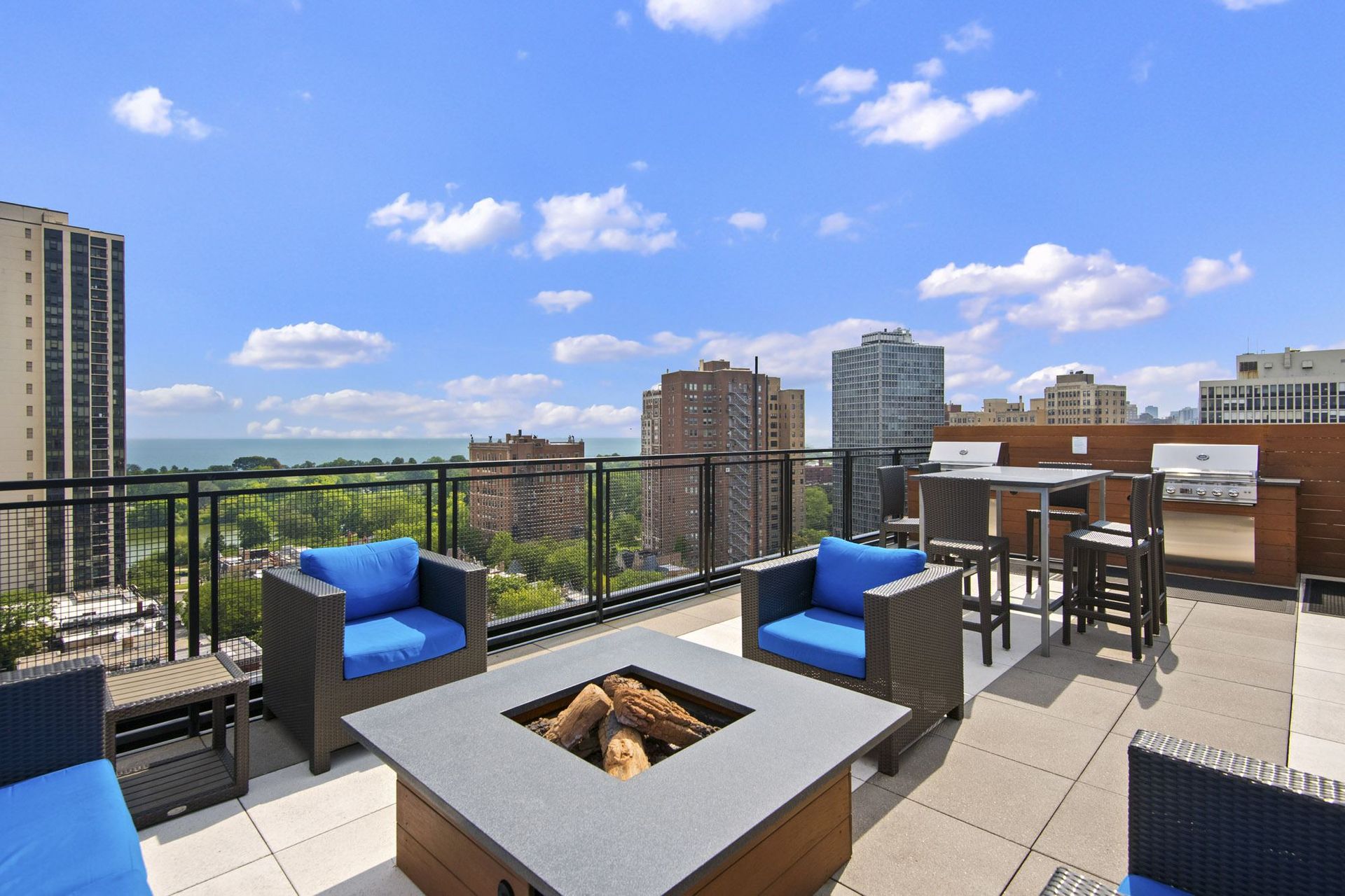Fire Pit and Chairs on Rooftop of Park Lincoln