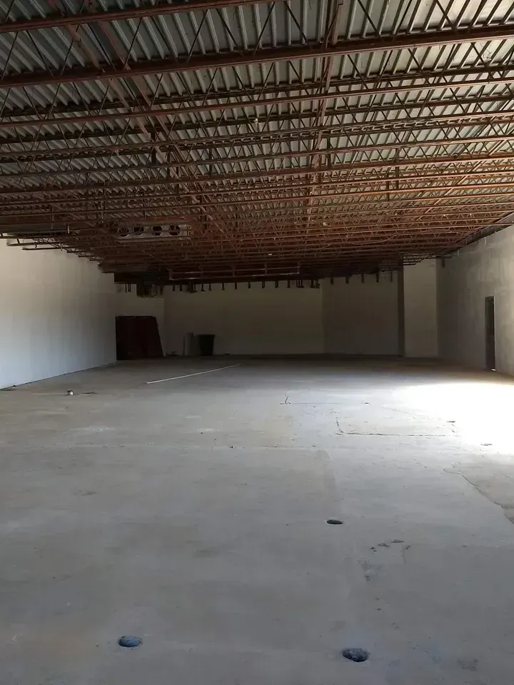 Contractors renovating outdated office space in Prosper Texas