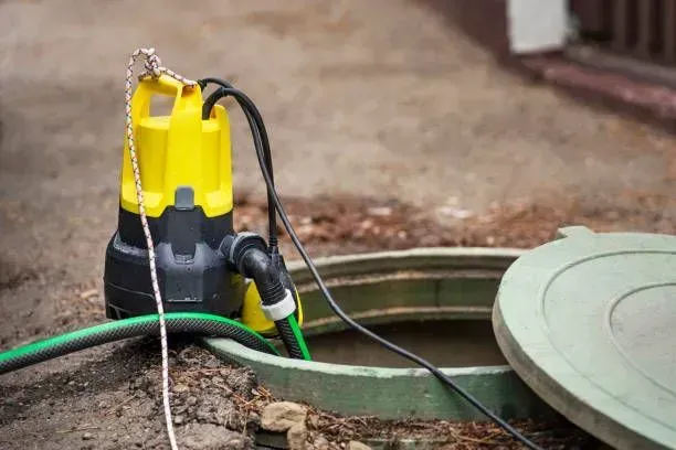 Electric submersible pump used for septic tank drainage.