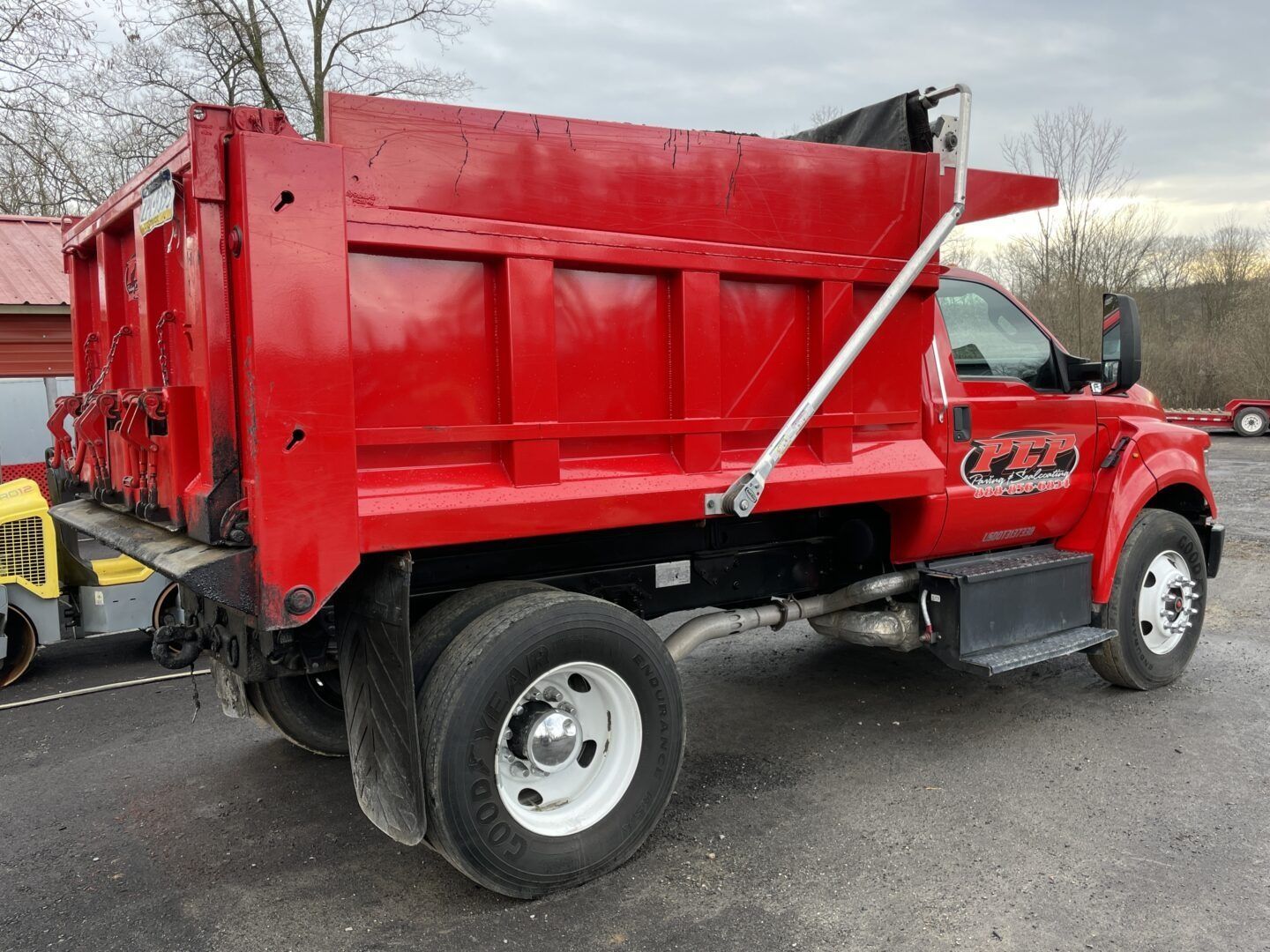 work truck driving down street