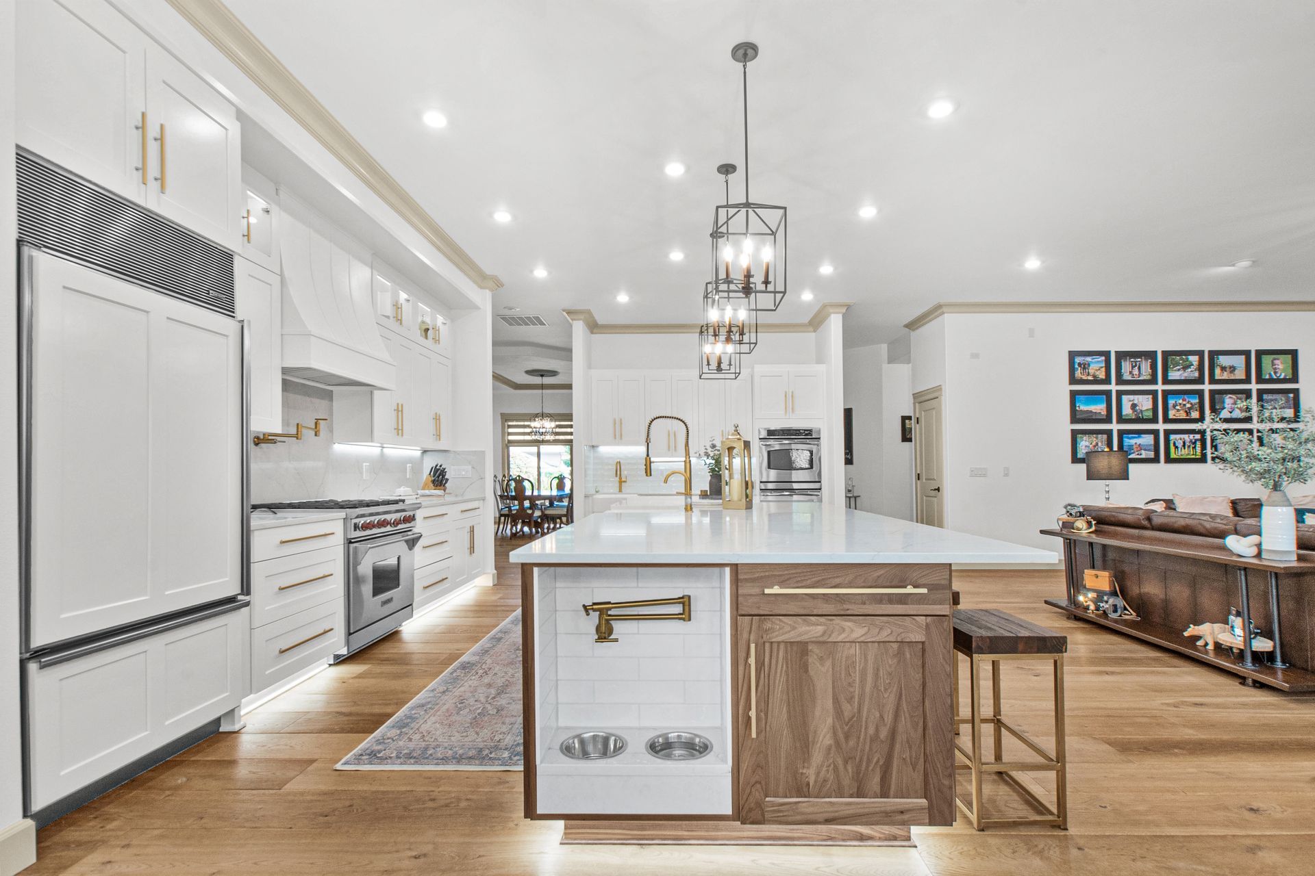 A kitchen with a large island in the middle of the room.