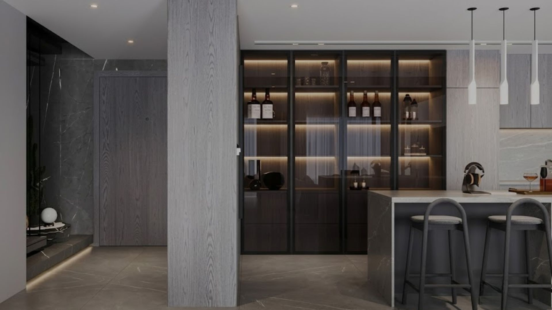 Modern dark kitchen and dining area with wood cabinetry, island stools, and warm backlit shelves