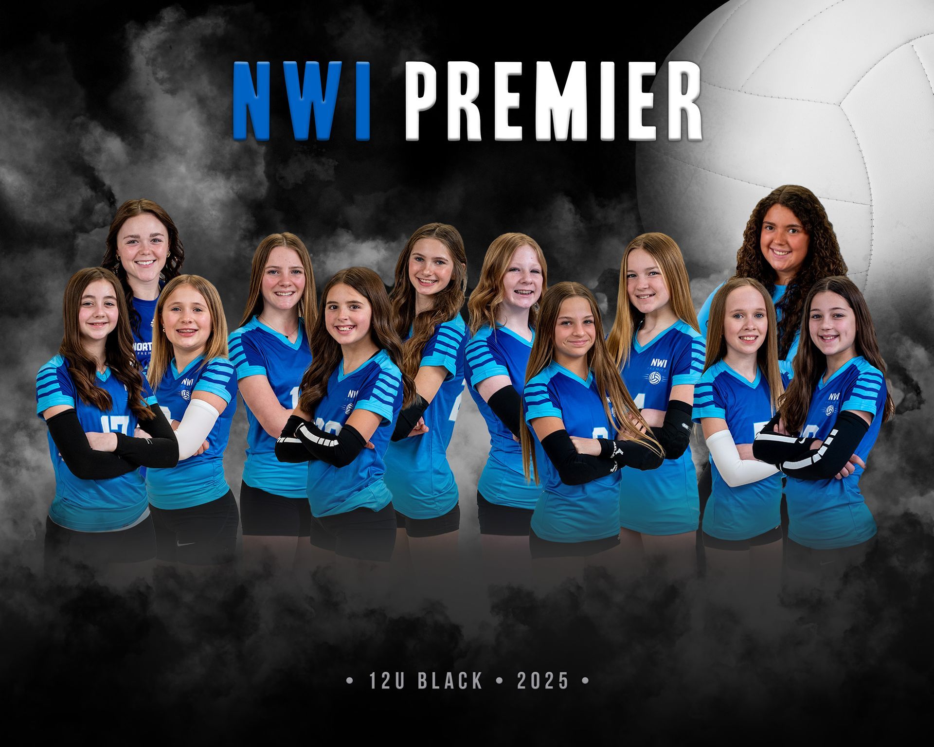 A volleyball team is posing for a picture in a gym.