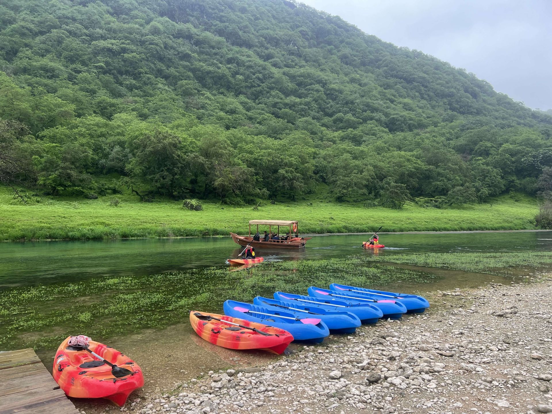 Lush green Mountain and wadi darbat in salalah with kayaking