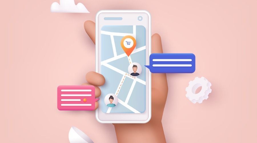 Uma mão segura um smartphone com um mapa na tela.