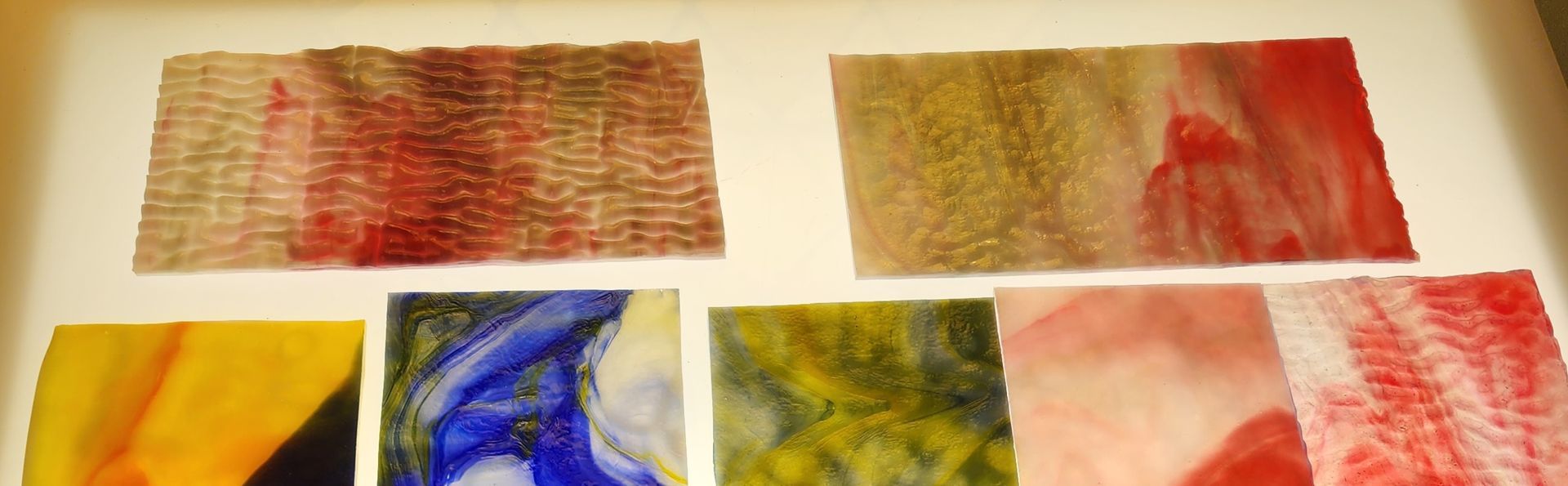 Burnt Red Ripple, Pink and Blue Agate Chicago Art Glass at Wisconsin Stained Glass Supplier in Hartford, Wisconsin. 