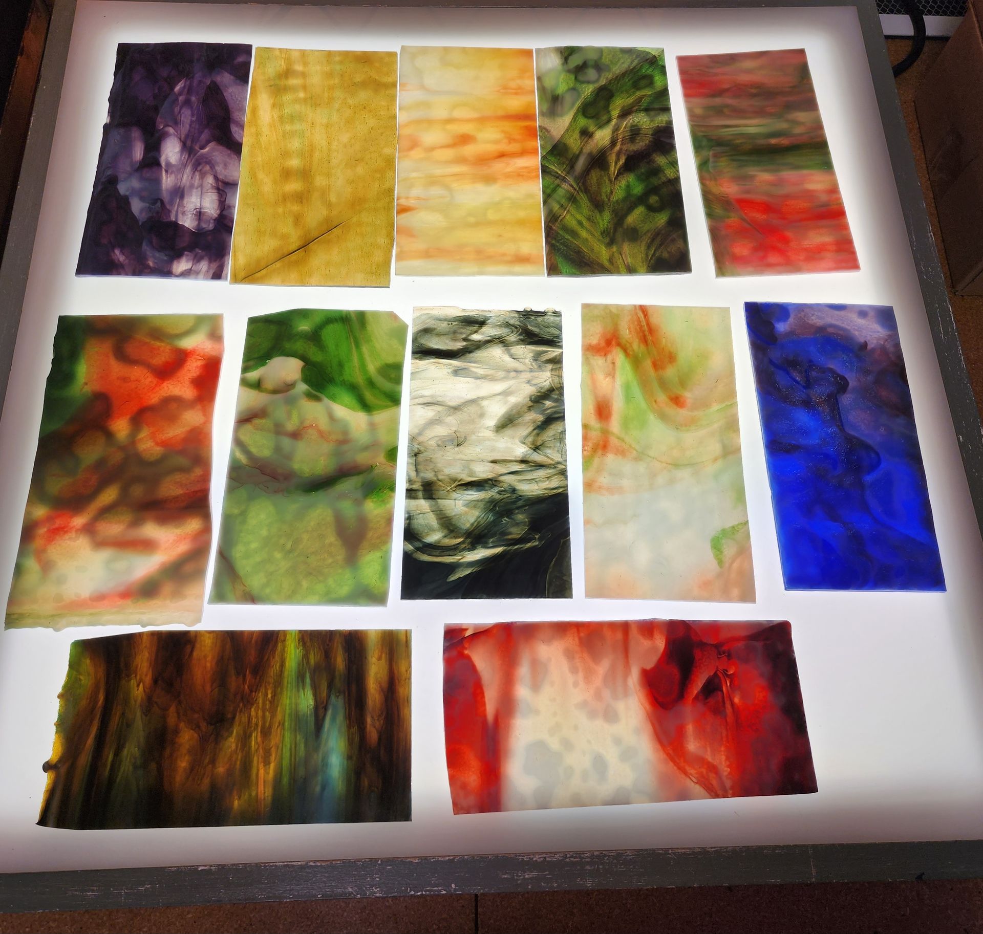 Spectacular small sheets of Chicago Aart Glass in bright blues, greens, reds and purples. 